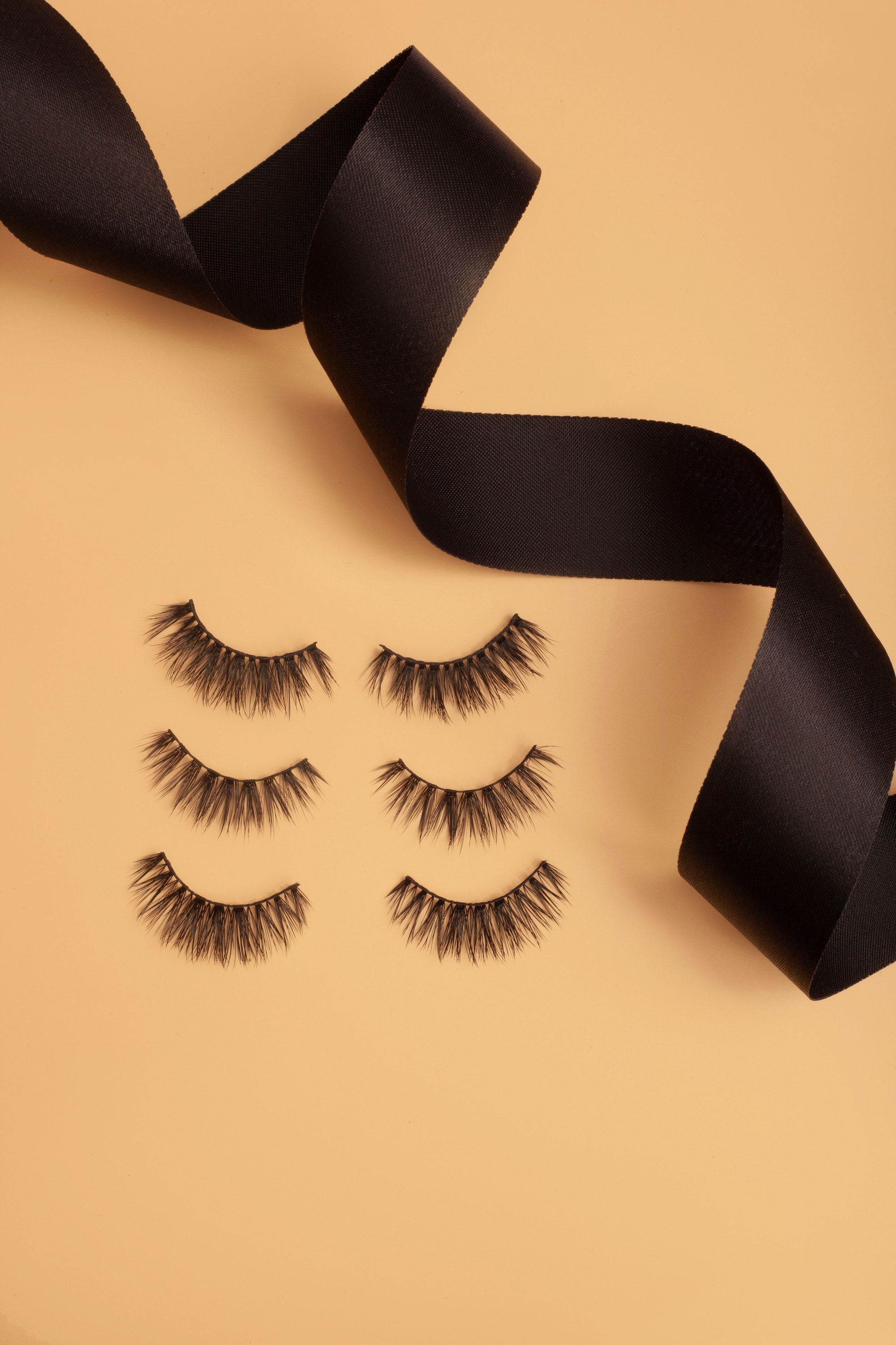 OKT Lashes. Best false eyelashes. Doll eyelashes. Best fake eyelashes. Edmonton False Eyelashes. Fake eyelashes. How to clean false eyelashes. How to apply false eyelashes. Fake eyelash storage. False eyelashes storage. Reusable false eyelashes.